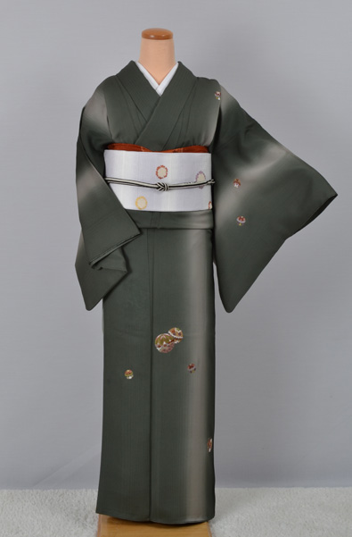 小紋［柑子色に小さな楽器や小槌］